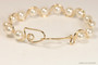 14k yellow gold filled wire wrapped bracelet with cream pearls handmade by Jessica Luu Jewelry