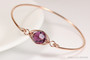 14k rose gold filled wire wrapped bangle bracelet with amethyst purple crystal handmade by Jessica Luu Jewelry