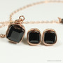 8mm jet black cube shaped Austrian crystal solitaire pendant in 14K rose gold filled wire wrapped setting hung on 18 inch long chain necklace with matching earrings handmade  by Jessica Luu Jewelry