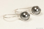 Sterling silver wire wrapped dark grey pearl drop earrings handmade by Jessica Luu Jewelry