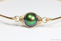 14k yellow gold filled wire wrapped bangle bracelet with scarabaeus green pearl handmade by Jessica Luu Jewelry