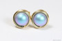 14K yellow gold filled wire wrapped stud earrings with iridescent light blue pearls handmade by Jessica Luu Jewelry