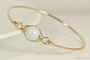 14k yellow gold filled wire wrapped bangle bracelet with pastel light blue pearl handmade by Jessica Luu Jewelry