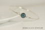 Sterling silver wire wrapped bangle bracelet with iridescent Tahitian pearl handmade by Jessica Luu Jewelry