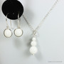 3 stone faceted round white alabaster gemstone pendant on sterling silver chain necklace with matching earrings handmade by Jessica Luu Jewelry