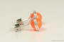 Sterling silver wire wrapped stud earrings with neon orange pearls handmade by Jessica Luu Jewelry