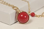 14K yellow gold filled wire wrapped red coral solitaire pendant on chain necklace handmade by Jessica Luu Jewelry