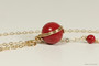 14K yellow gold filled wire wrapped red coral solitaire pendant on chain necklace handmade by Jessica Luu Jewelry