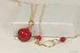 14K yellow gold filled wire wrapped red coral solitaire pendant on chain necklace handmade by Jessica Luu Jewelry
