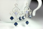 Sterling silver wire wrapped dark indigo blue crystal chandelier earrings handmade by Jessica Luu Jewelry