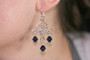 Sterling silver wire wrapped dark indigo blue crystal chandelier earrings handmade by Jessica Luu Jewelry