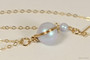 14K rose gold filled wire wrapped iridescent light dreamy blue pearl solitaire pendant on chain necklace handmade by Jessica Luu Jewelry