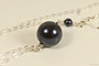 Sterling silver wire wrapped dark navy night blue pearl pendant on chain necklace handmade by Jessica Luu Jewelry