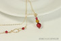 14K yellow gold filled wire wrapped orange topaz and scarlet red crystal pendant on chain necklace handmade by Jessica Luu Jewelry
