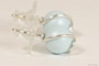 Sterling silver wire wrapped pastel light blue pearl stud earrings handmade by Jessica Luu Jewelry