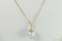 14K yellow gold filled wire wrapped iridescent dreamy blue pearl pendant on chain necklace handmade by Jessica Luu Jewelry