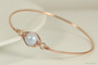 14K rose gold filled wire wrapped iridescent dreamy blue pearl solitaire bangle bracelet handmade by Jessica Luu Jewelry