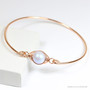 14K rose gold filled bangle bracelet with 10mm iridescent powder blue pearl solitaire handmade by Jessica Luu Jewelry