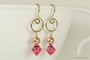 14K yellow gold filled dangle earrings with rose gold pearls and Indian pink crystals handmade by Jessica Luu Jewelry