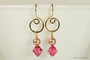 14K yellow gold filled dangle earrings with rose gold pearls and Indian pink crystals handmade by Jessica Luu Jewelry