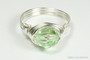 Sterling silver wire wrapped light green chrysolite crystal solitaire ring handmade by Jessica Luu Jewelry