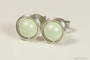 Sterling silver wire wrapped light pastel green pearl stud earrings handmade by Jessica Luu Jewelry