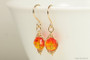 14K yellow gold filled herringbone wire wrapped fire opal orange crystal dangle earrings handmade by Jessica Luu Jewelry