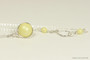 Sterling silver wire wrapped pastel yellow pearl solitaire necklace handmade by Jessica Luu Jewelry