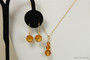 14K gold filled orange topaz crystal pendant necklace and earrings set handmade by Jessica Luu Jewelry