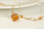 14K gold filled wire wrapped orange topaz crystal cube pendant necklace handmade by Jessica Luu Jewelry