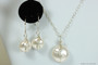 Sterling silver wire wrapped white flat coin pearl dangle earrings and necklace set handmade by Jessica Luu Jewelry