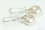 Sterling silver wire wrapped white flat coin pearl dangle earrings handmade by Jessica Luu Jewelry