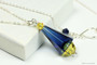 Sterling silver necklace with dark blue and yellow crystal pendant handmade by Jessica Luu Jewelry