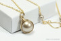 14K gold filled wire wrapped champagne pearl solitaire on chain handmade by Jessica Luu Jewelry