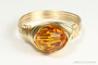 14K yellow gold filled wire wrapped 8mm faceted, round orange topaz crystal solitaire ring handmade by Jessica Luu Jewelry