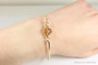 14K yellow gold filled wire wrapped champagne crystal bangle bracelet handmade by Jessica Luu Jewelry