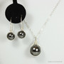 Sterling silver wire wrapped 12mm black pearl solitaire pendant on chain necklace and earrings set handmade by Jessica Luu Jewelry