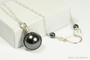 Sterling silver wire wrapped 12mm black pearl solitaire pendant on chain necklace handmade by Jessica Luu Jewelry