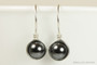 Sterling silver wire wrapped black pearl drop earrings handmade by Jessica Luu Jewelry