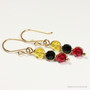 14K yellow gold filled wire wrapped dangle earrings with yellow red and black crystals handmade by Jessica Luu Jewelry