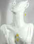 Sterling silver wire wrapped yellow and clear crystal pendant on chain necklace and earrings set handmade by Jessica Luu Jewelry
