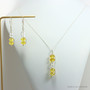 Sterling silver wire wrapped yellow and clear crystal pendant on chain necklace and earrings set handmade by Jessica Luu Jewelry