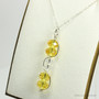 Sterling silver wire wrapped yellow and clear crystal pendant on chain necklace handmade by Jessica Luu Jewelry