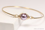 14K yellow gold filled bangle bracelet with 10mm mauve purple pearl solitaire handmade by Jessica Luu Jewelry