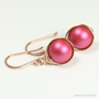 14K rose gold filled wire wrapped dangle earrings with 10mm dark berry pink pearls handmade by Jessica Luu Jewelry