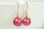 14K rose gold filled wire wrapped dangle earrings with 10mm dark berry pink pearls handmade by Jessica Luu Jewelry