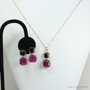 14K rose gold filled wire wrapped earrings with 6mm navy blue faceted cube Austrian crystal posts and 8mm fuchsia pink purple faceted cube Austrian crystal drops and matching necklace handmade by Jessica Luu Jewelry