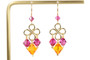 14K yellow gold filled chandelier earrings with fuchsia and bright orange Austrian crystal dangles handmade by Jessica Luu Jewelry