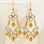 14K yellow gold filled chandelier earrings with orange and golden yellow topaz Austrian crystals handmade by Jessica Luu Jewelry