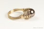 10mm dark chocolate brown pearl solitaire ring in 14K yellow gold filled wire wrapped setting handmade by Jessica Luu Jewelry